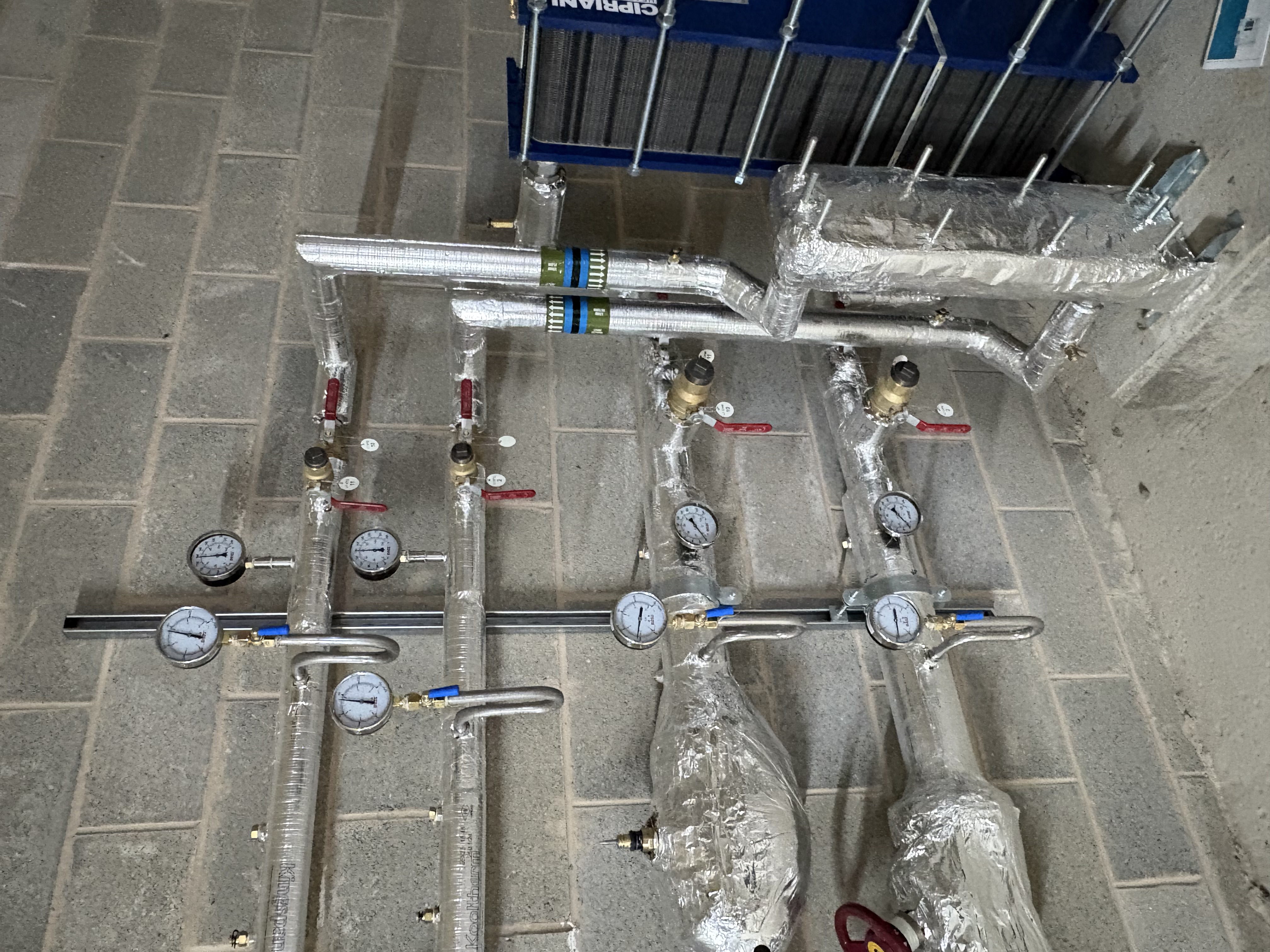 Detailed view of pressure gauges and valves