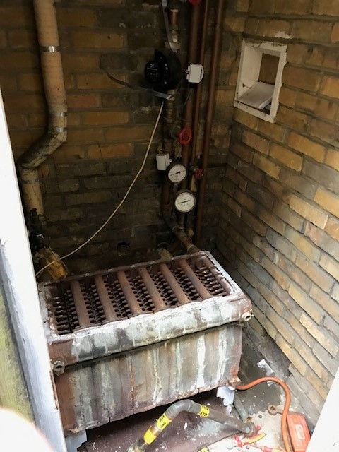 Old heating system before replacement